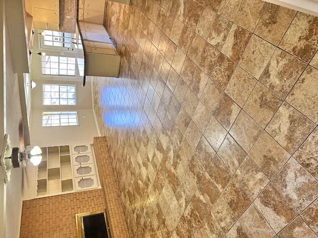 Residential tile and grout floor cleaned to a brilliant shine by Bulldog Carpet Cleaning in Greenville, TX